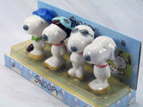 Snoopy 4-Piece Porcelain Figurine Set - RARE!
