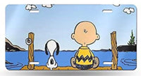 Charlie Brown and Snoopy Sitting On Dock Metal License Plate