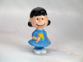 Lucy Holding Flower PVC - snoopn4pnuts.com