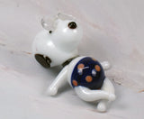 Snoopy Sunbathing Mini Porcelain Figurine With Clear Glass Sunglasses - RARE!   (Near Mint)