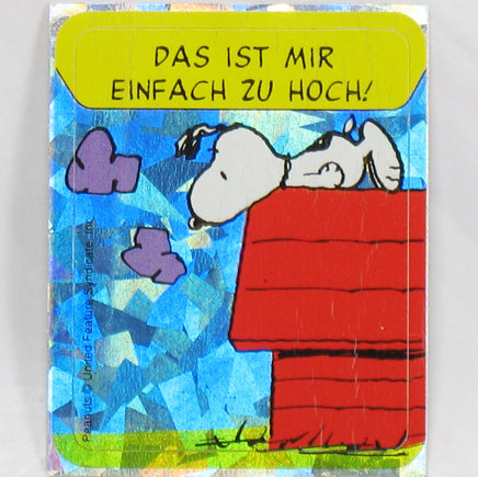 Snoopy DAZZLING Prismatic / Holographic German Sticker - Snoopy On Dog House - snoopn4pnuts.com