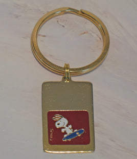 Snoopy Vintage Skateboarder Gold - Tone Key Chain - snoopn4pnuts.com