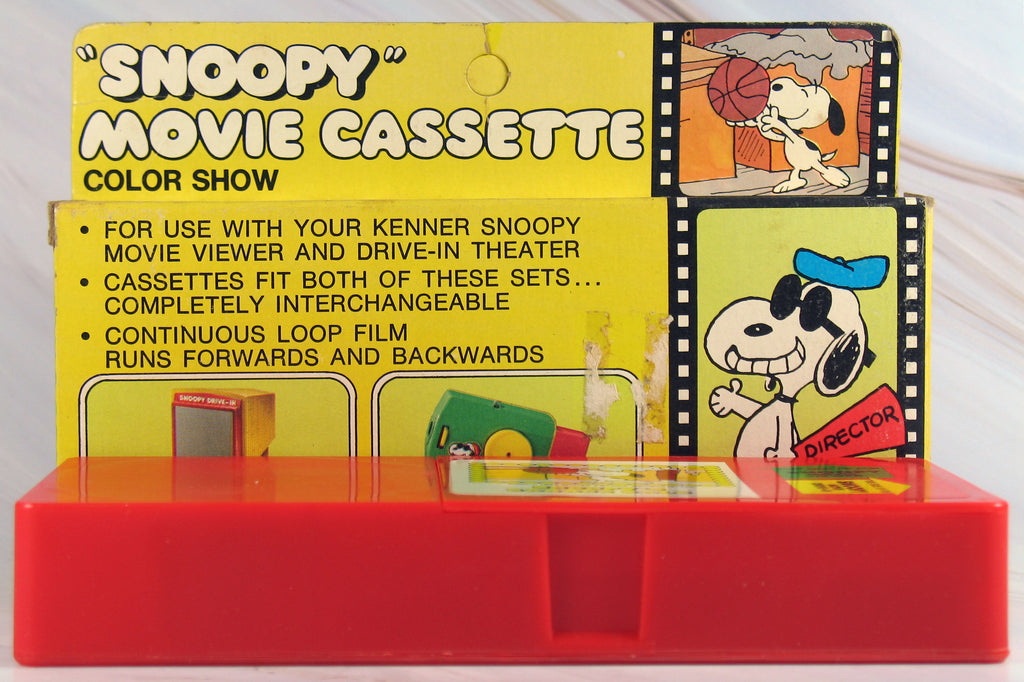 Snoopy's Garage Sale Hand Held Movie Cassette