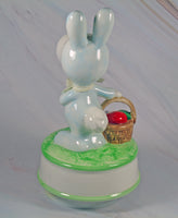 1985 Snoopy Easter Bunny Musical Figurine (Music Plays Slowly) - snoopn4pnuts.com
