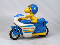 Woodstock on Friction-Powered Jump Cycle (GOOD CONDITION)