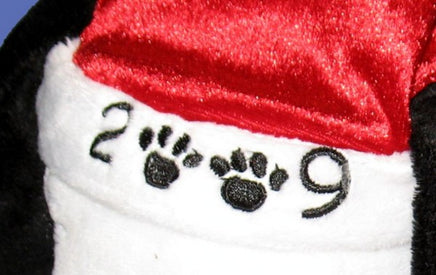 2009 Snoopy Santa Plush Doll