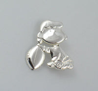 Lucy Holding Football Sterling Silver Pin
