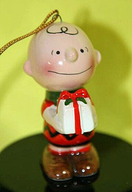 1975 Charlie Brown Holding Christmas Gift Ornament - snoopn4pnuts.com