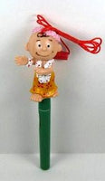 Charlie Brown wearing hula skirt pen with lanyard