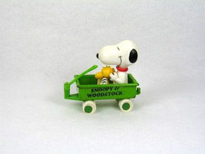 Snoopy and Woodstock in metal wagon