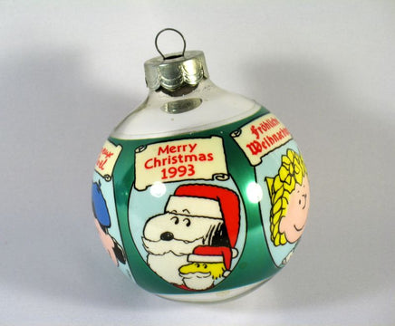 1993 Peanuts Glass Ball Christmas Ornament - "Merry Christmas" In 5 Languages - snoopn4pnuts.com