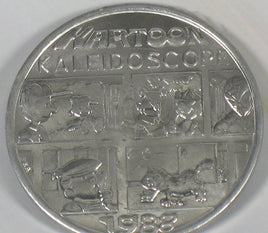 1988 Mardi Gras Plastic Coin - Charlie Brown and Lucy Comic Panel - snoopn4pnuts.com