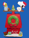 Snoopy and Woodstock Animated, Musical, and Lighted See-Saw Doghouse - Plays "Jingle Bell Rock"