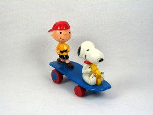 Charlie Brown and Snoopy On Skateboard