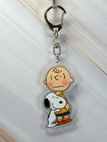 Peanuts Acrylic Swivel Key Chain - Snoopy Hugs Charlie Brown