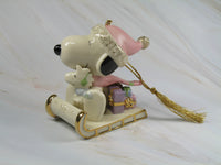 2002 Lenox Snoopy's Sledding Adventure Fine China Christmas Ornament With 24K Gold Accents