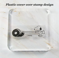 Imported Peanuts Clear Vinyl Stamp On Thick Acrylic Block - Snoopy's Tape Roll