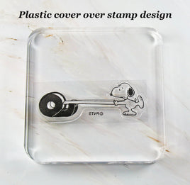 Imported Peanuts Clear Vinyl Stamp On Thick Acrylic Block - Snoopy's Tape Roll - snoopn4pnuts.com