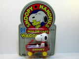 Snoopy in metal wagon