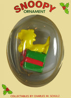 Woodstock On Gift Christmas Ornament