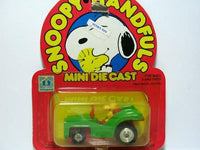 Woodstock drives diecast car